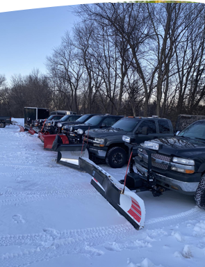 David's Lawn Service doing Snow Removal A Picture of Commercial Grade Trucks